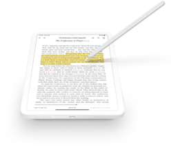A tablet tilted at an angle with a stylus, displaying commentary from the ebook highlighted in yellow