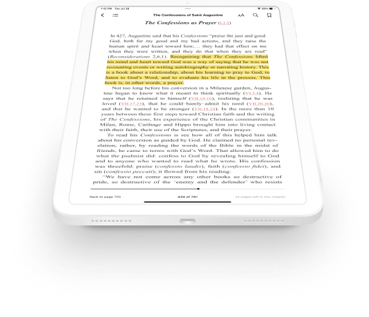 A tablet tilted at an angle displaying commentary from the ebook highlighted in yellow